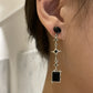 Cara Niche Asymmetric Earrings